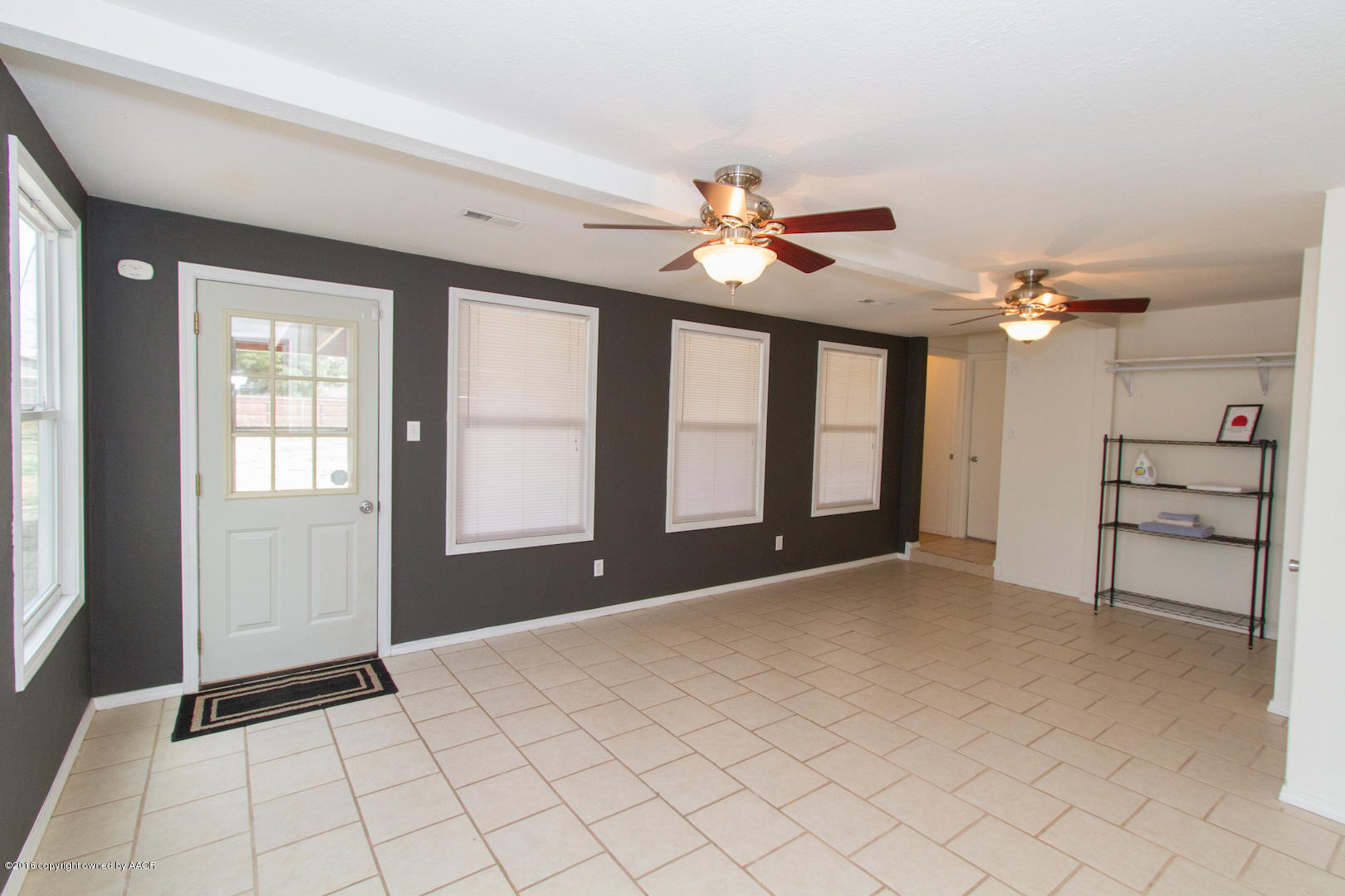 4818 Camp Lane Amarillo, TX 79110 - Photo 15 of 32 a view of an empty room with a window