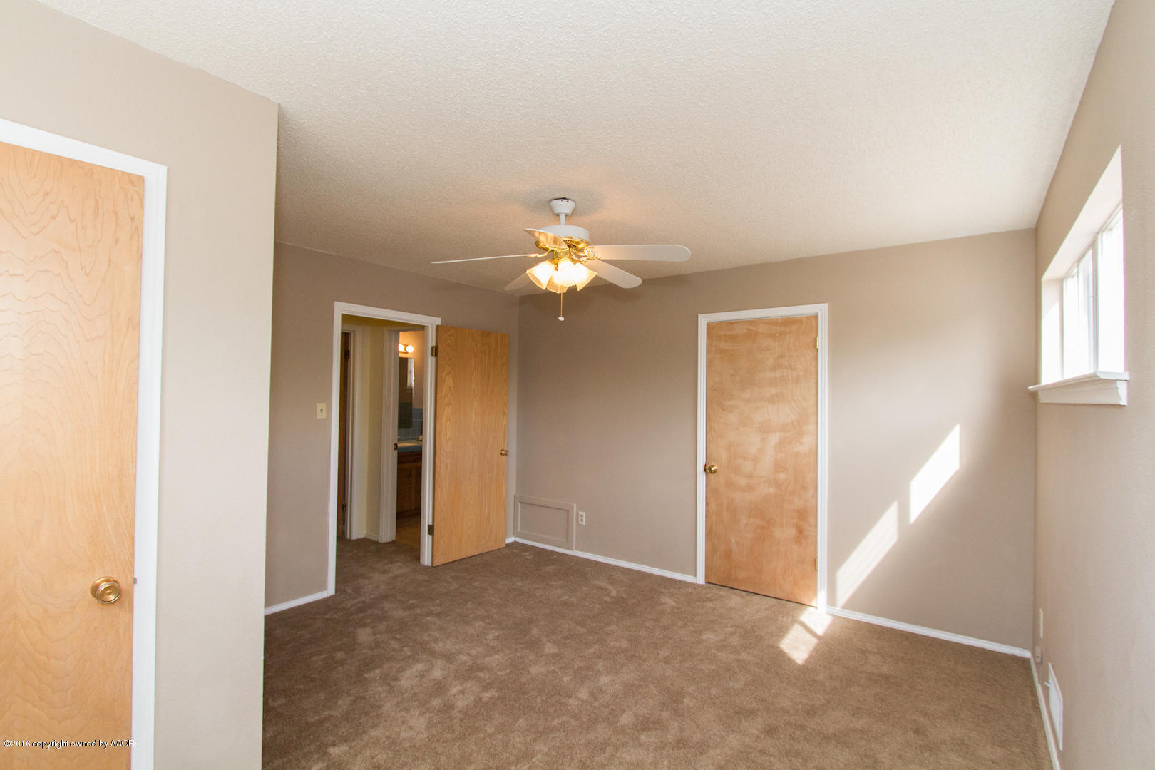 4818 Camp Lane Amarillo, TX 79110 - Photo 27 of 32 a view of a livingroom with a chandelier fan