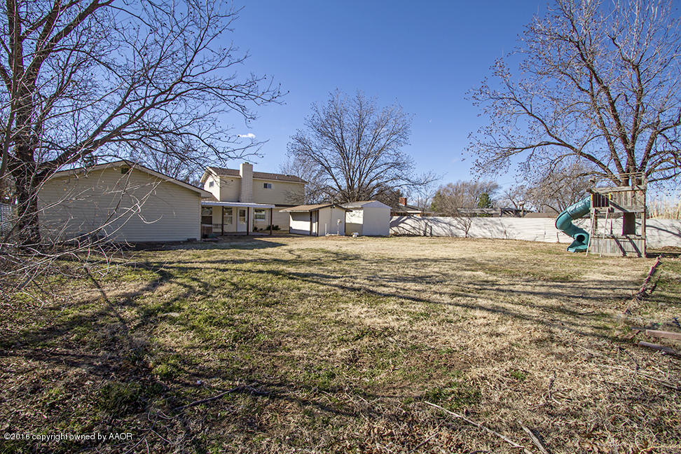 4818 Camp Lane Amarillo, TX 79110 - Photo 31 of 32 a view of a yard with snow on the road