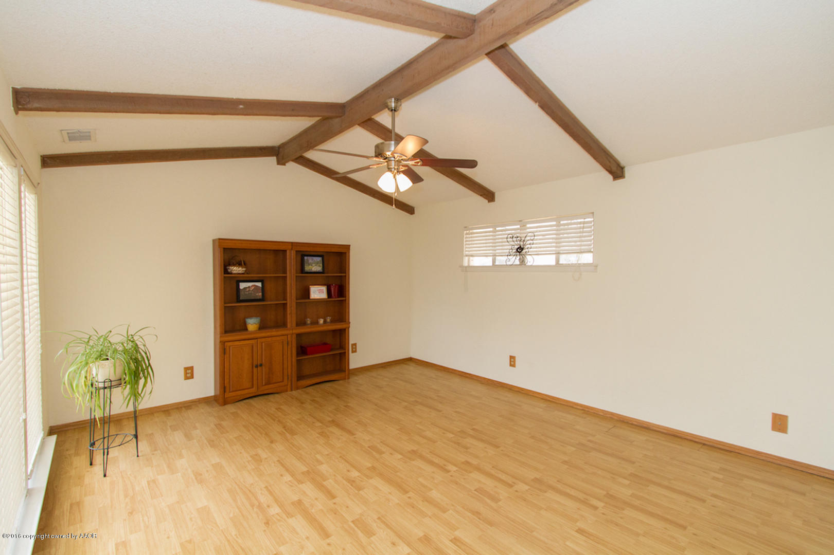 4818 Camp Lane Amarillo, TX 79110 - Photo 6 of 32 a view of a big room with closet and cabinet