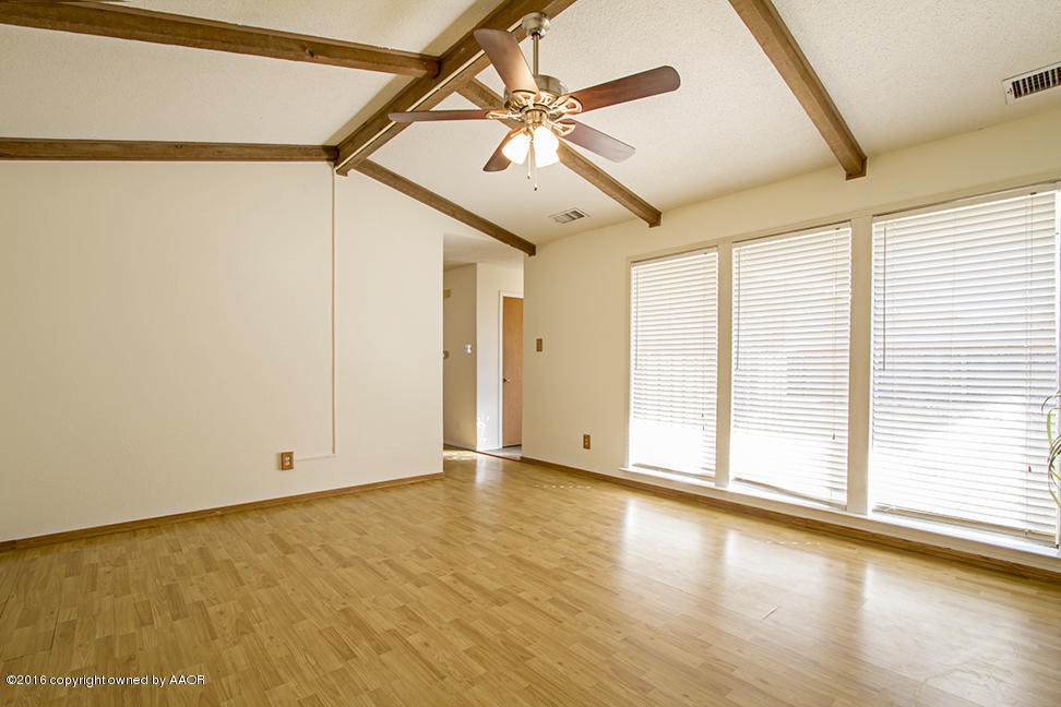 4818 Camp Lane Amarillo, TX 79110 - Photo 7 of 32 a view of an empty room with a window