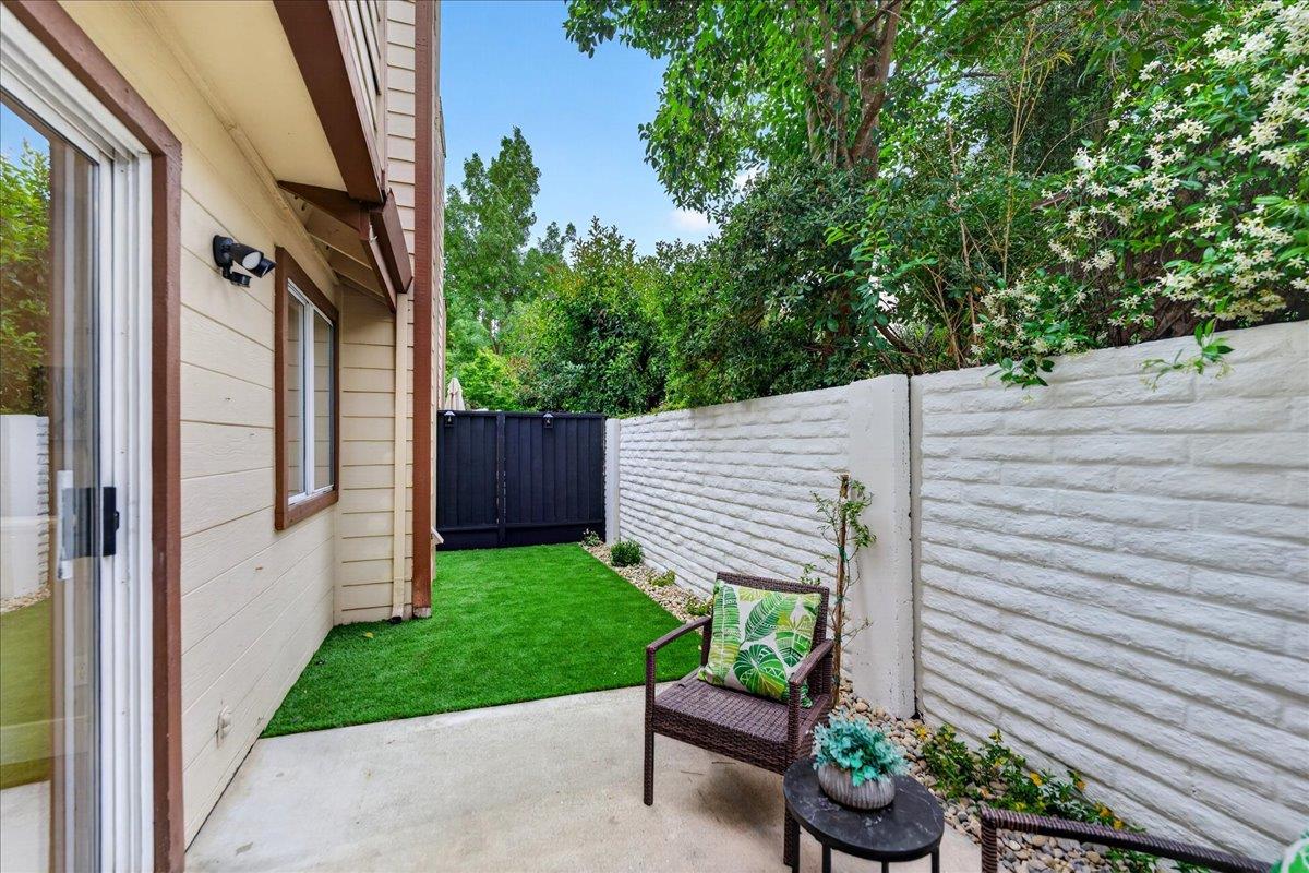 244 Rachael Place Pleasanton, CA 94566 - Photo 21 of 24 a backyard of a house with lots of green space