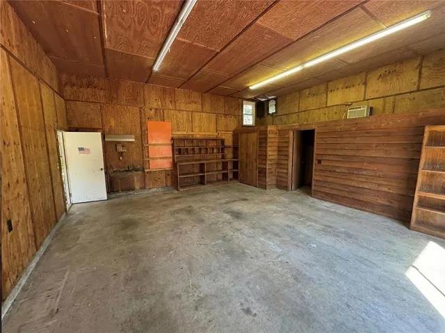 a view of empty room with stairs