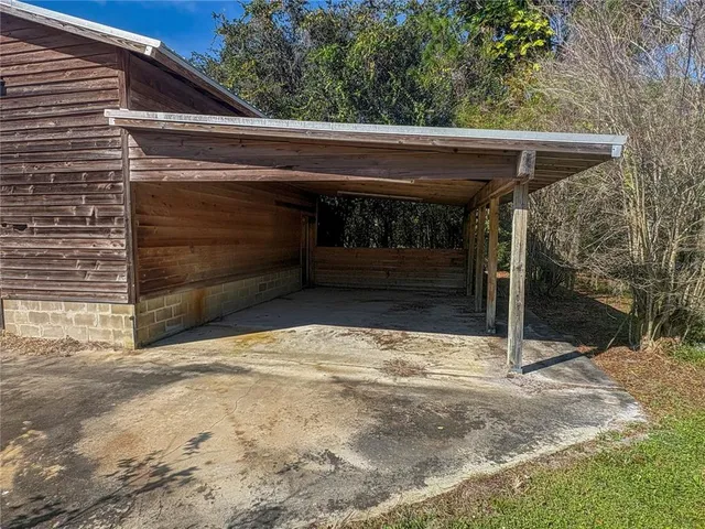 a view of wooden door and outdoor space
