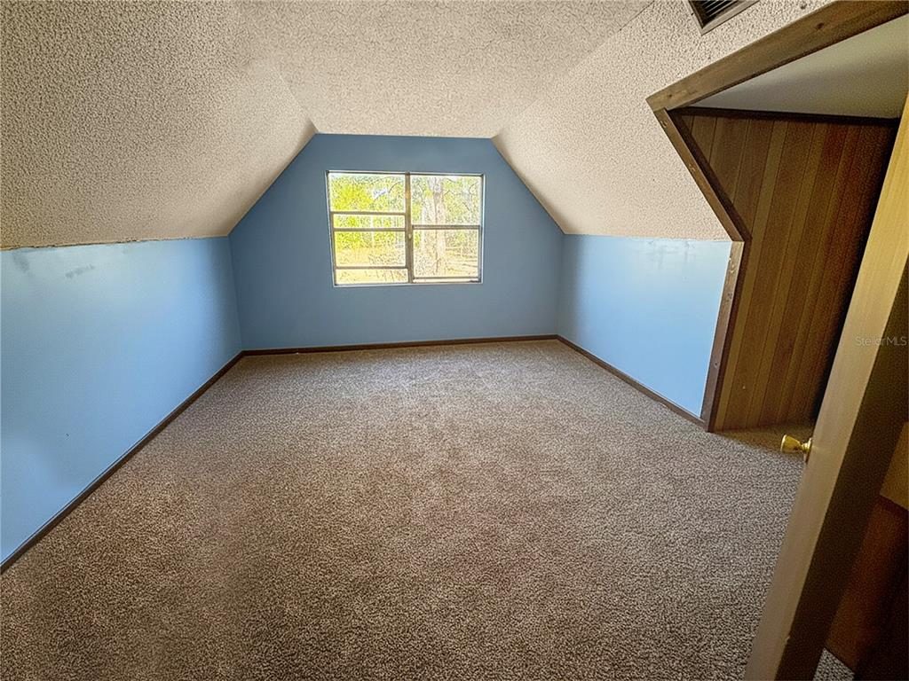 5237 Moore Street St. Cloud, FL 34771 - Photo 13 of 19 an empty room with a window