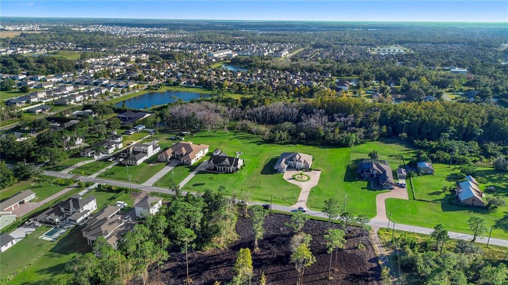 5237 Moore Street St. Cloud, FL 34771 - Photo 17 of 19 an aerial view of a house with a garden