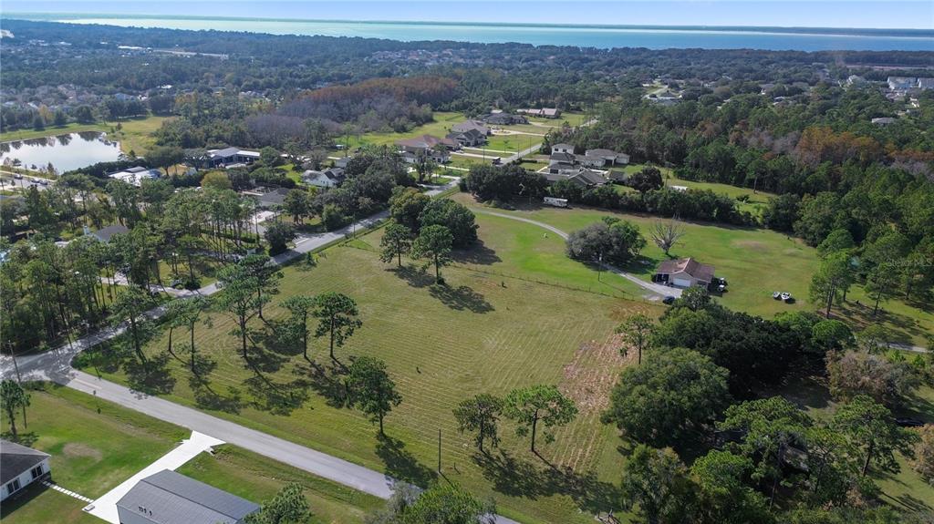 5237 Moore Street St. Cloud, FL 34771 - Photo 5 of 19 an aerial view of residential house with outdoor space and river view