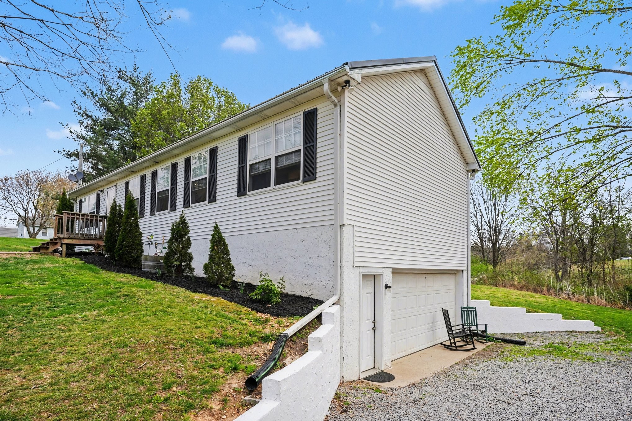 550 Gregory Road Westmoreland, TN 37186 - Photo 22 of 26 a front view of a house with garden