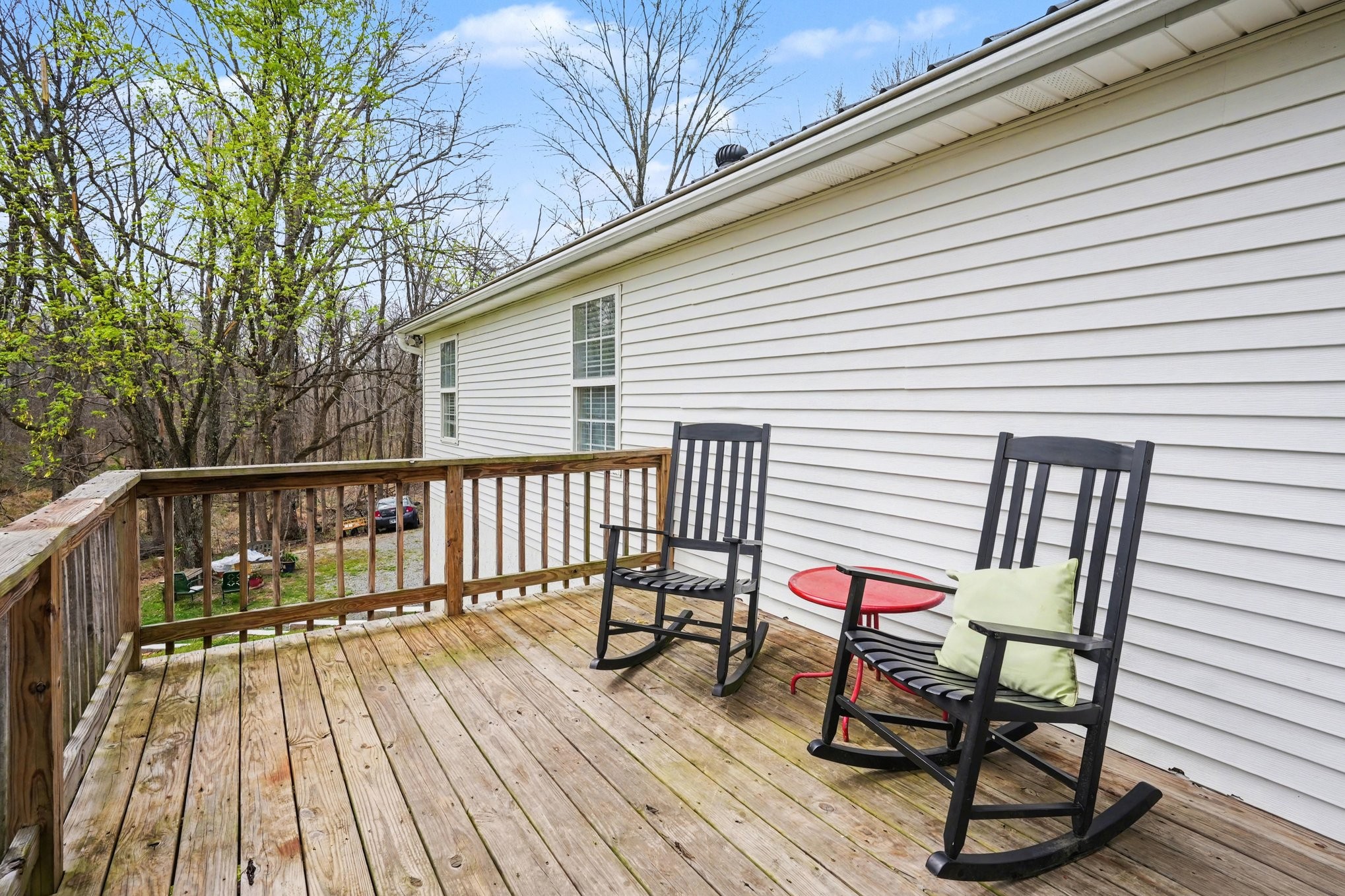 550 Gregory Road Westmoreland, TN 37186 - Photo 26 of 26 a balcony with wooden floor outdoor seating and wooden floor