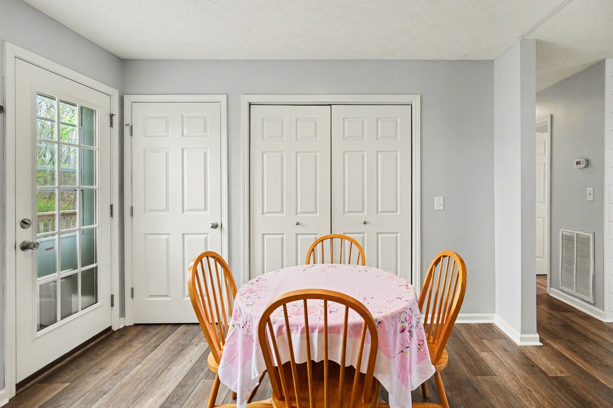 550 Gregory Road Westmoreland, TN 37186 - Photo 9 of 26 a view of a a dining room with furniture window and wooden floor