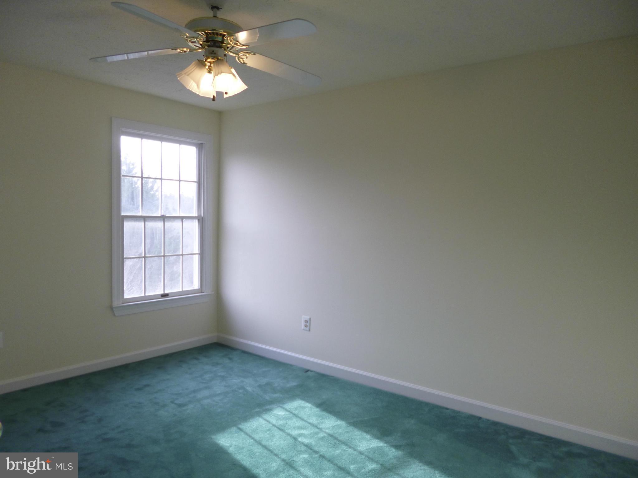 8837 Herons Flight Laurel, MD 20723 - Photo 20 of 29 an empty room with a window