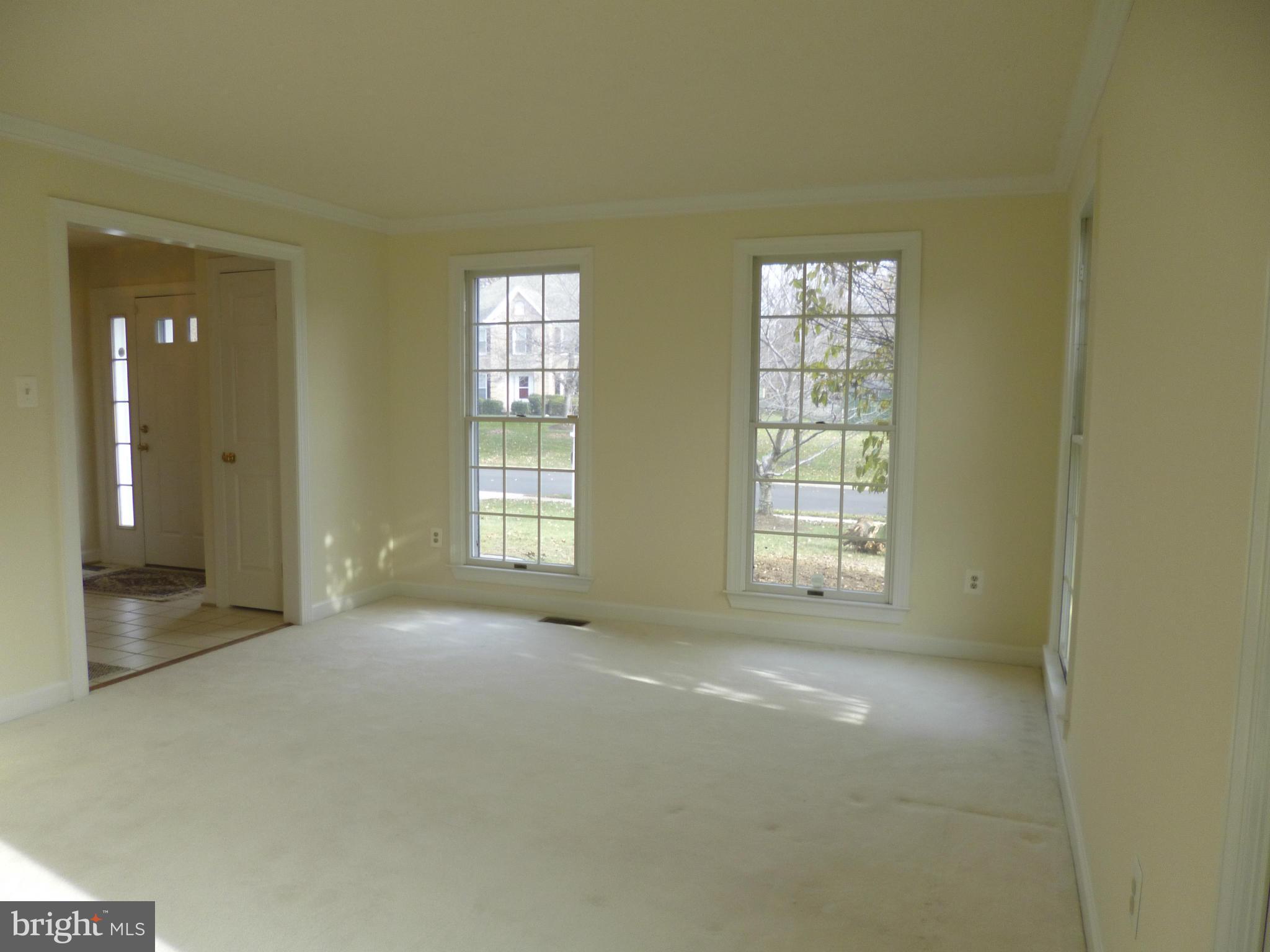 8837 Herons Flight Laurel, MD 20723 - Photo 3 of 29 a view of an empty room with a window