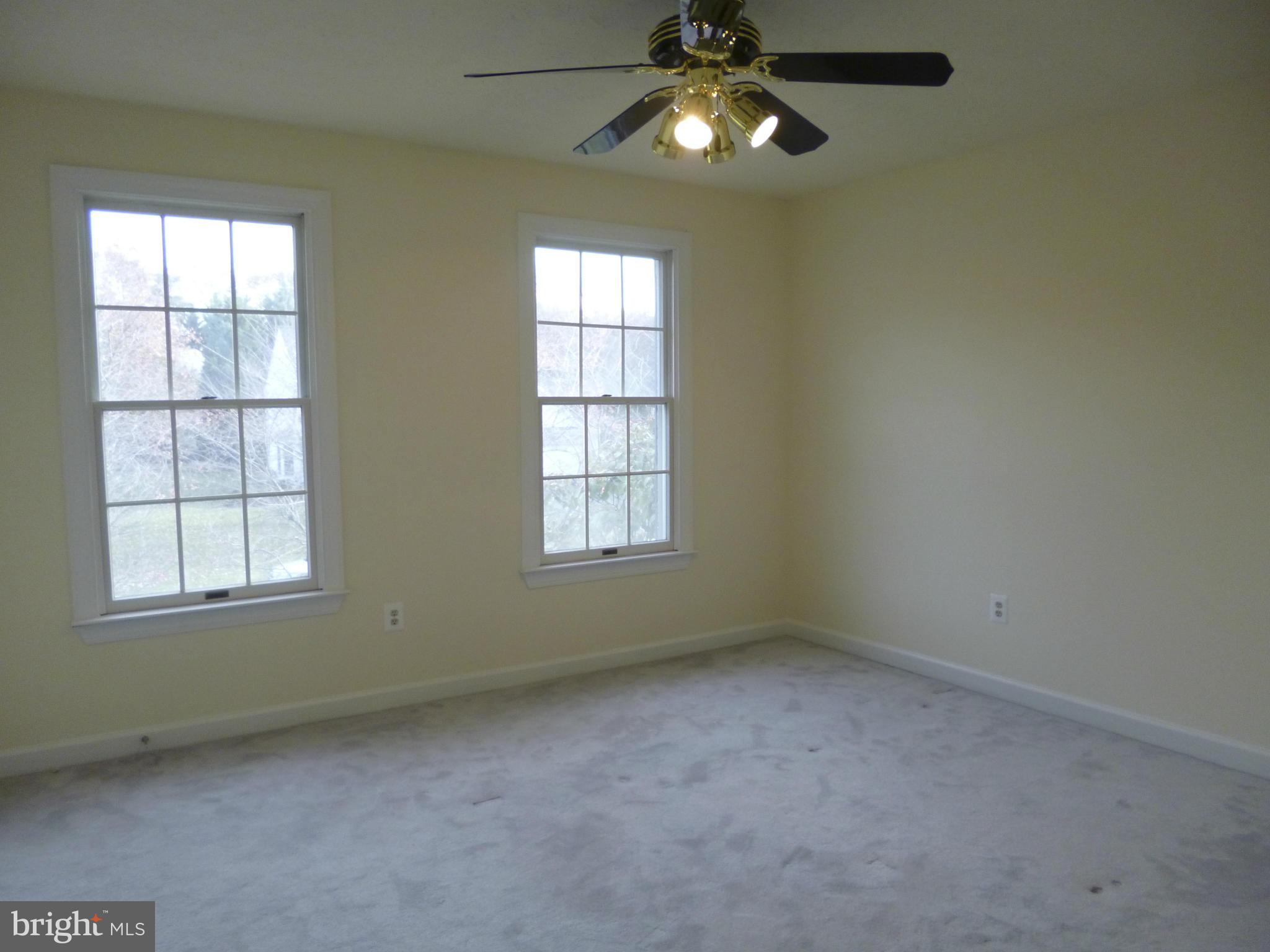 8837 Herons Flight Laurel, MD 20723 - Photo 22 of 29 an empty room with a window