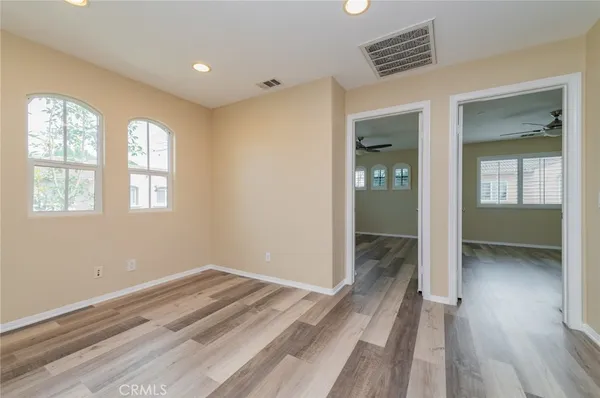 wooden floor and windows in a room