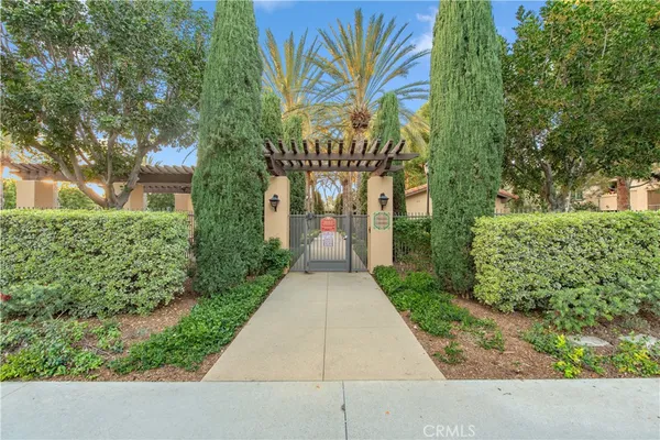 a front view of a house with a yard and a garage