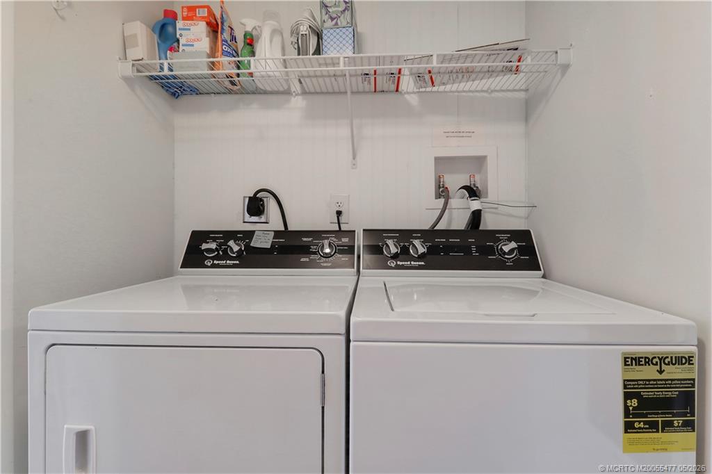 1852 Southwest Palm City Road, Unit 201 Stuart, FL 34994 - Photo 25 of 34 a close view of washer and dryer