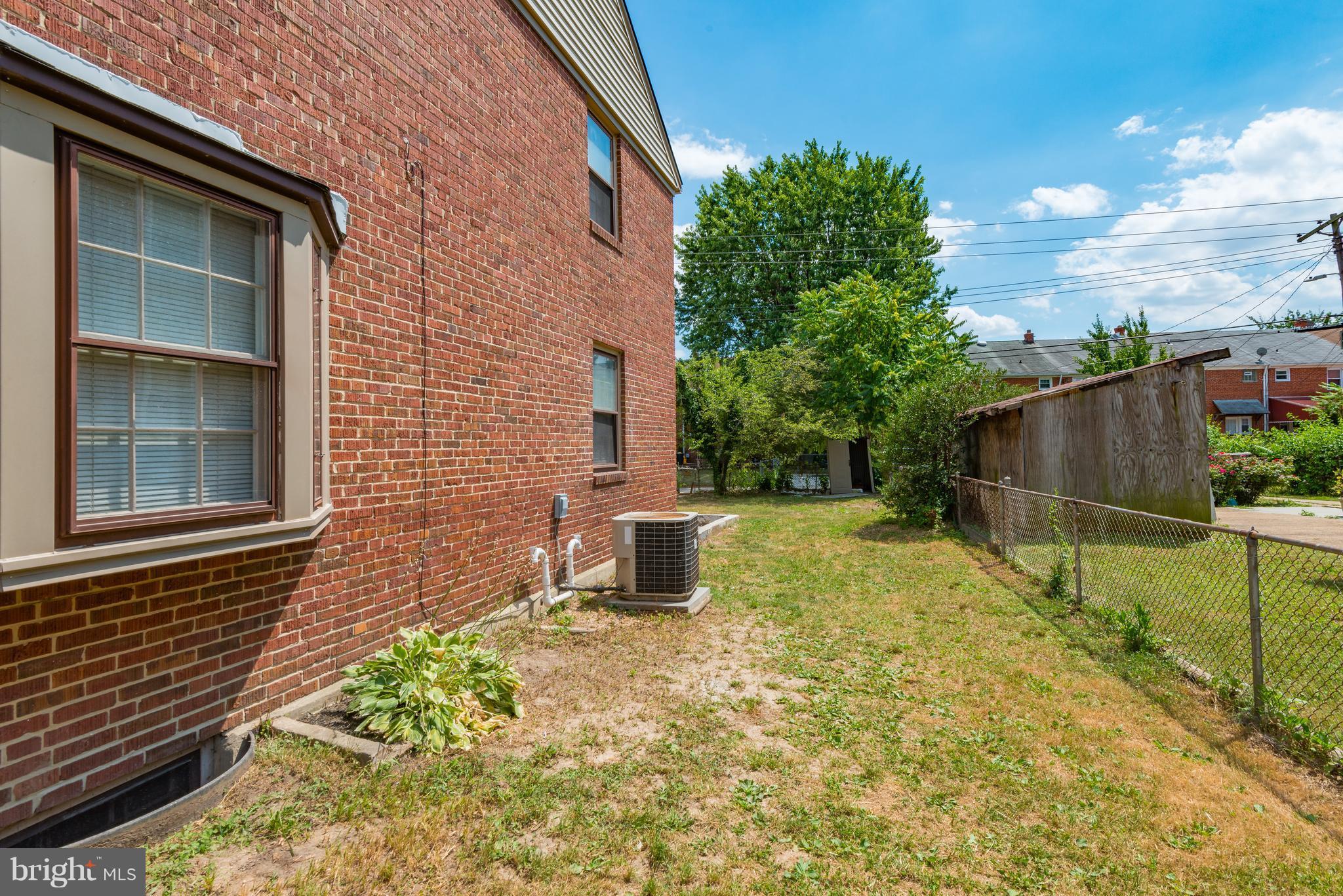 1265 Cedarcroft Road Baltimore, MD 21239 - Photo 4 of 21 a backyard of a house