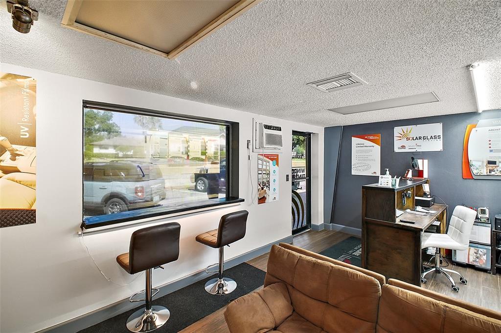 3101 Kurt Street Eustis, FL 32726 - Photo 12 of 43 a living room with furniture and a large window