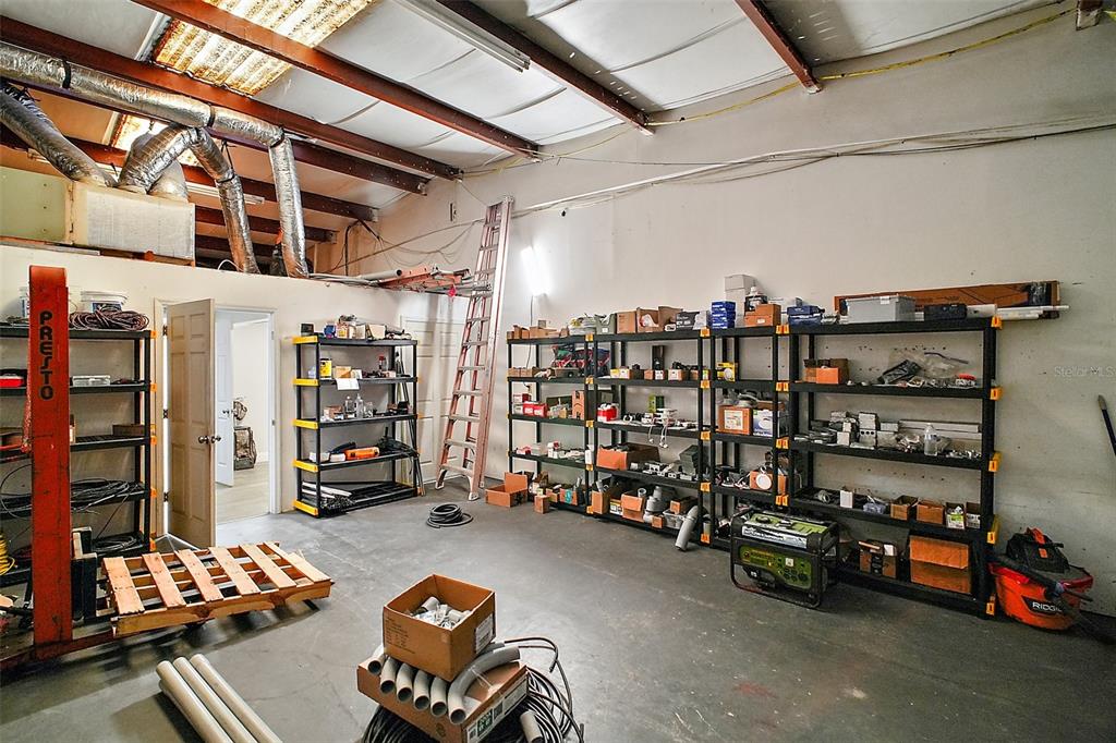 3101 Kurt Street Eustis, FL 32726 - Photo 22 of 43 a view of store room with racks