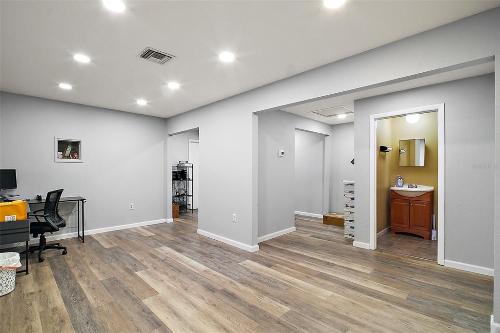 3101 Kurt Street Eustis, FL 32726 - Photo 31 of 43 a view of livingroom with furniture and wooden floor