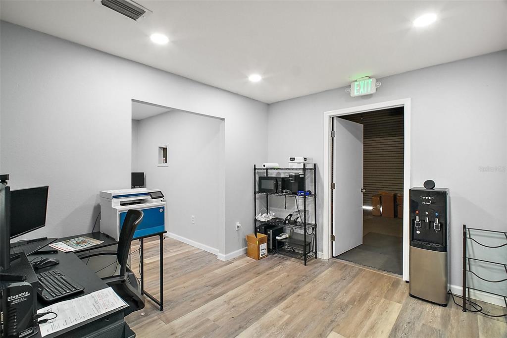 3101 Kurt Street Eustis, FL 32726 - Photo 34 of 43 a view of a workspace with furniture and wooden floor