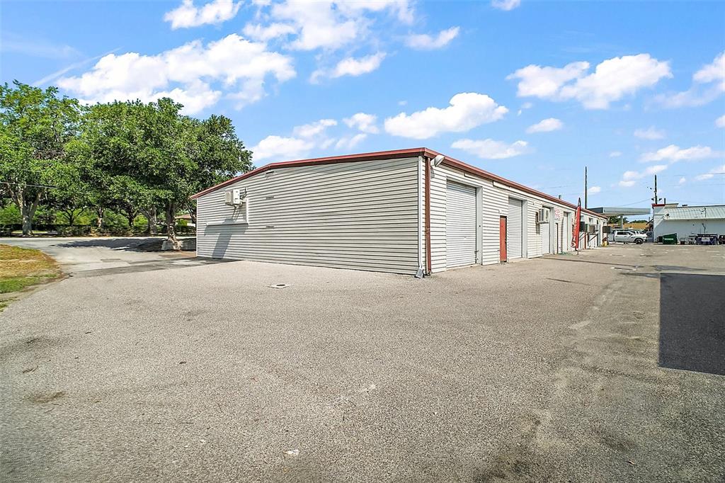 3101 Kurt Street Eustis, FL 32726 - Photo 37 of 43 a view of a house with a backyard