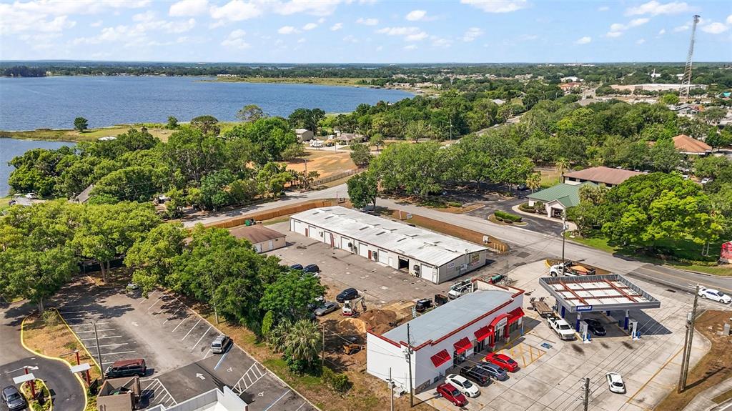 3101 Kurt Street Eustis, FL 32726 - Photo 43 of 43 an aerial view of a building with outdoor space and lake view