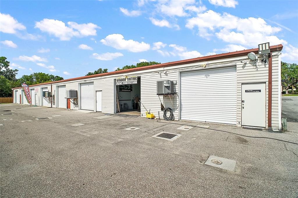 3101 Kurt Street Eustis, FL 32726 - Photo 9 of 43 a view of a white house with a outdoor space