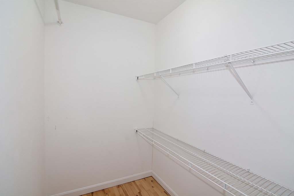 711 Little Rest Road Warren, MA 01010 - Photo 16 of 33 a view of a room with racks on the wall