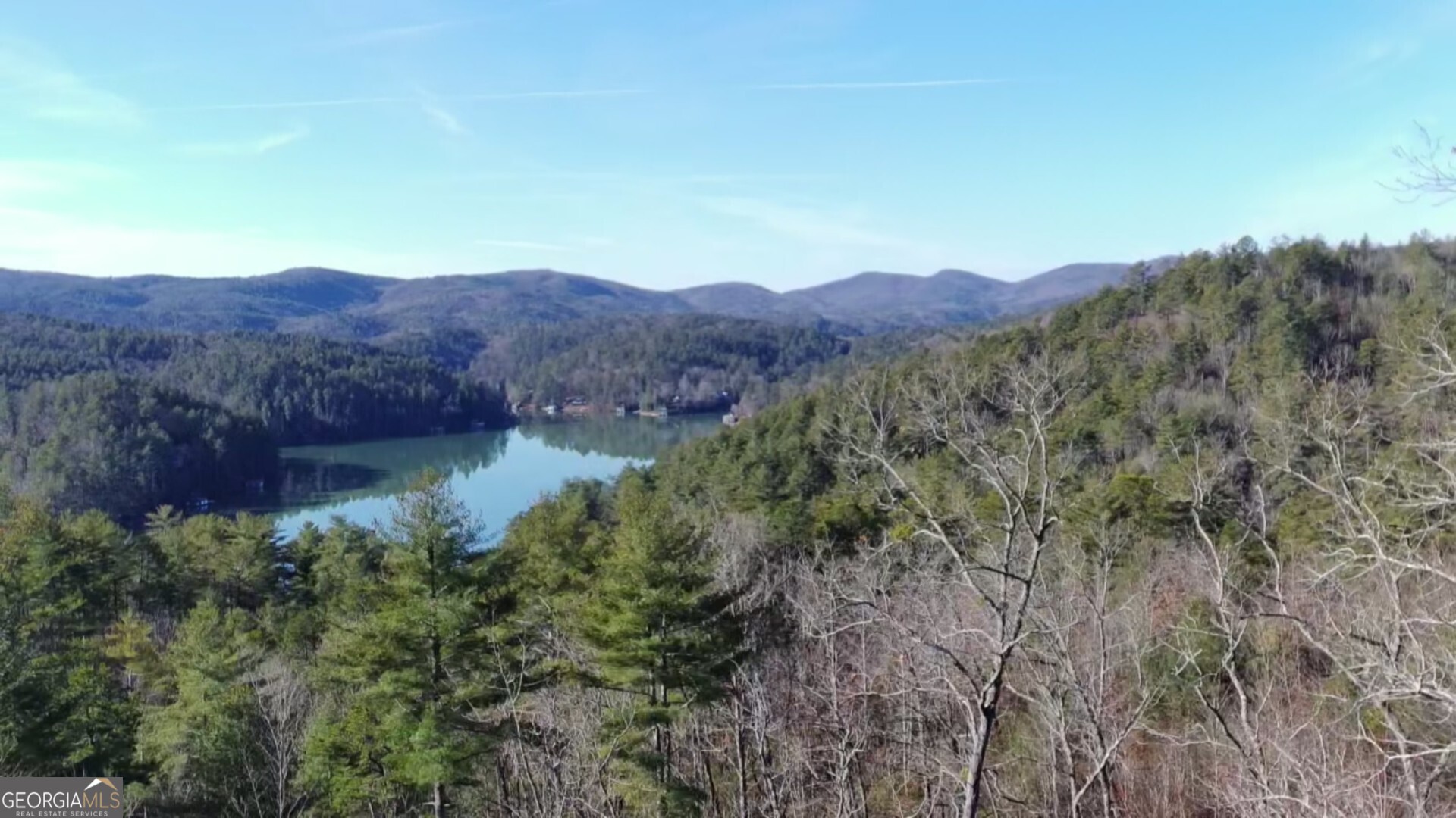 16 Rabun Bluffs, Unit 16 Lakemont, GA 30552 - Photo 11 of 28 a view of a lush green hillside and a building