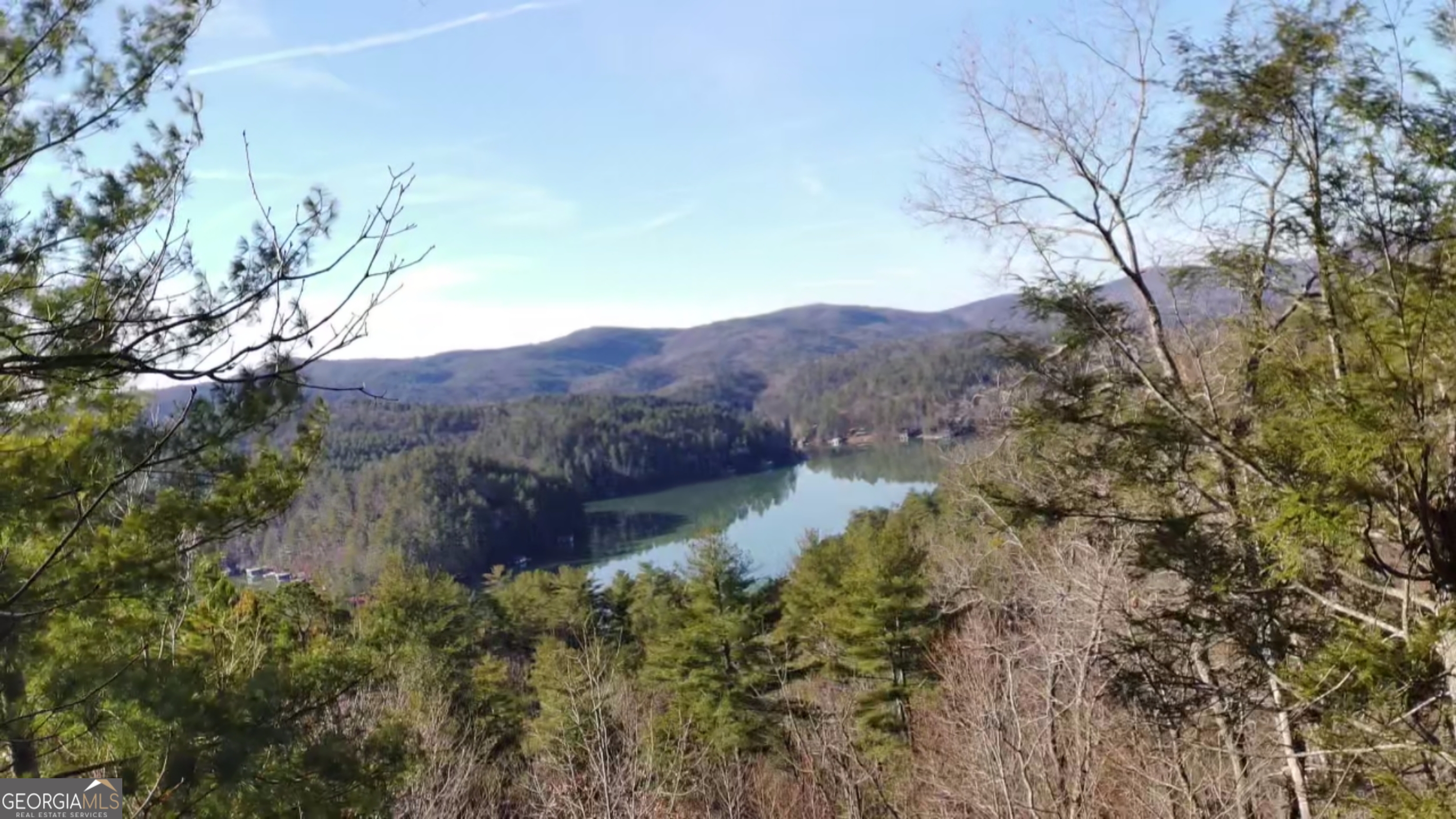 16 Rabun Bluffs, Unit 16 Lakemont, GA 30552 - Photo 17 of 28 a view of a dry yard with mountains in the background