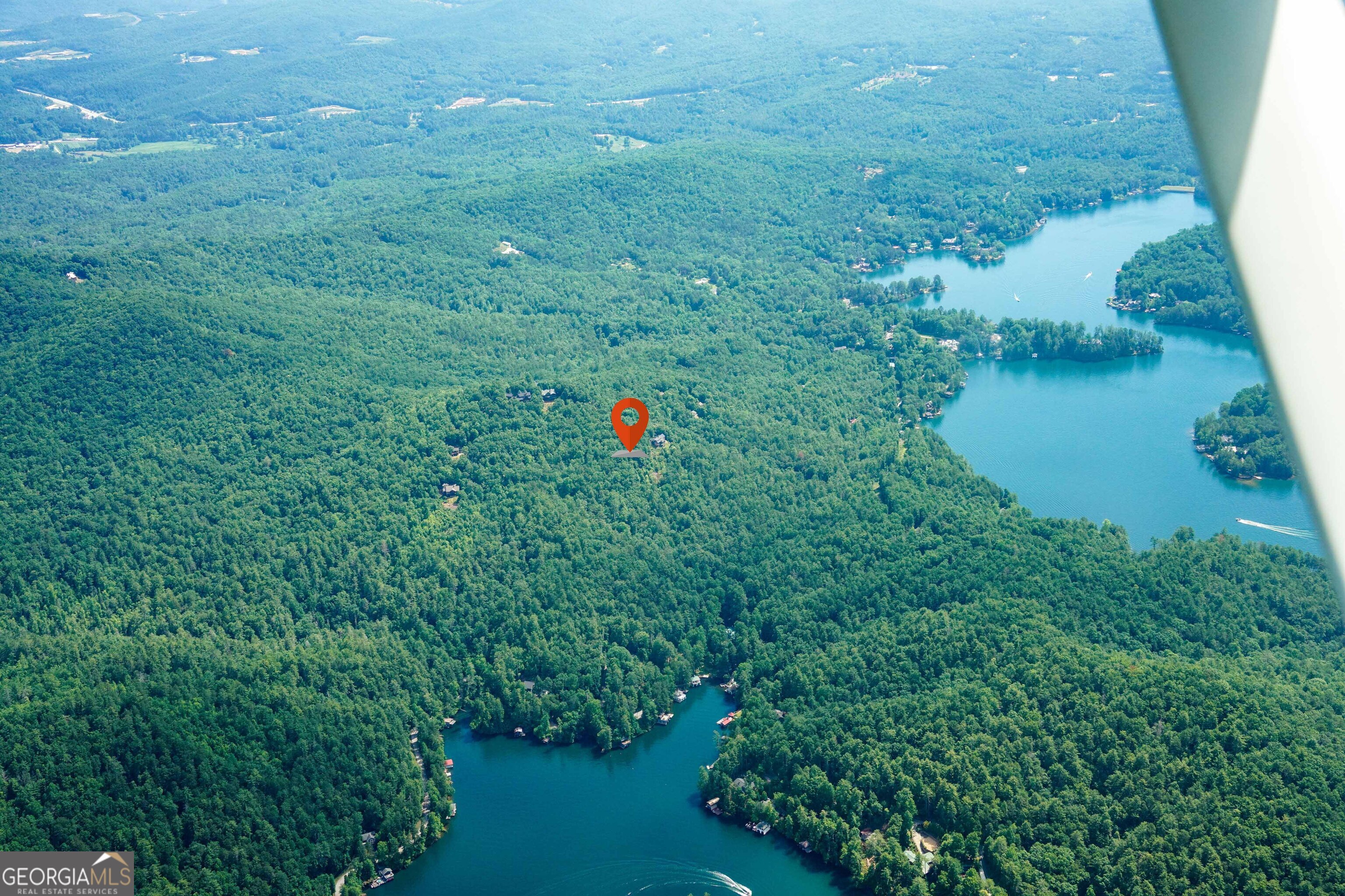16 Rabun Bluffs, Unit 16 Lakemont, GA 30552 - Photo 21 of 28 a view of a lake with a house