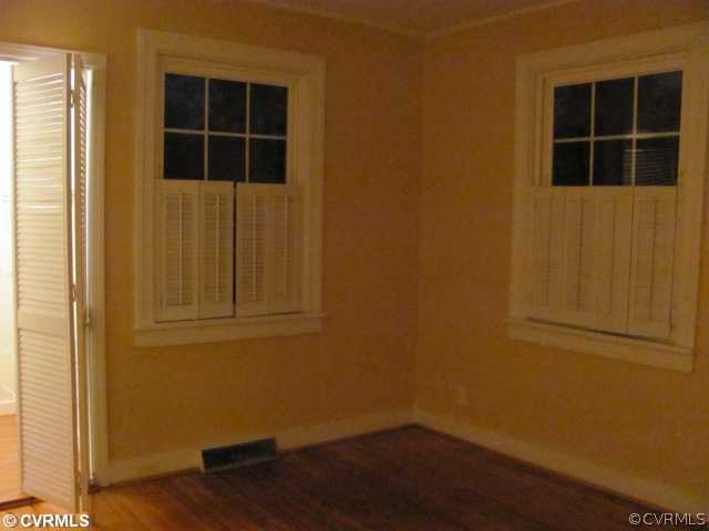 4725 Cooks Road Richmond, VA 23224 - Photo 6 of 7 Bedroom - Hardwood Floors in Bedroom - newer windo