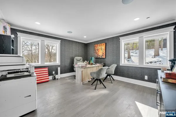 a bathroom with a granite countertop toilet a sink and a bathtub