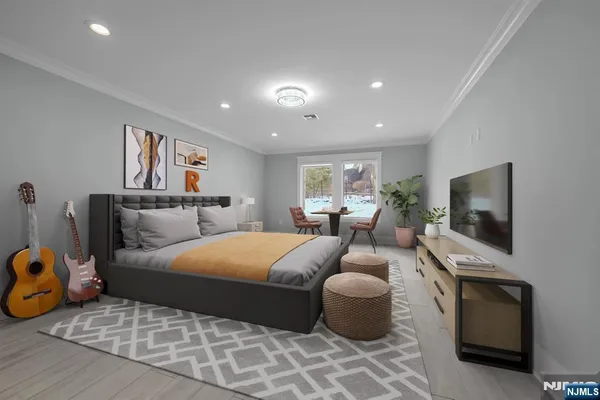 a bathroom with a double vanity sink a large mirror and shower
