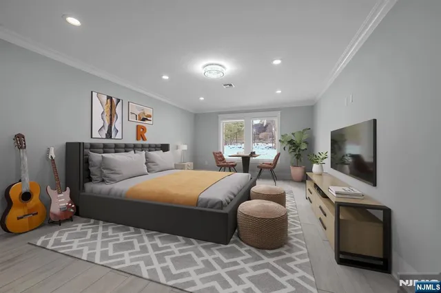a bathroom with a double vanity sink a large mirror and shower