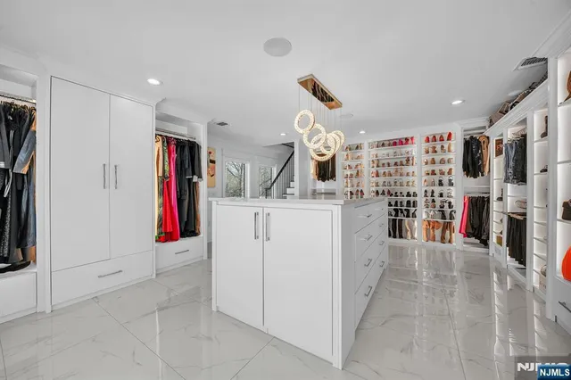 a view of living room with furniture and window