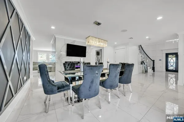a kitchen with stainless steel appliances granite countertop a stove and a sink