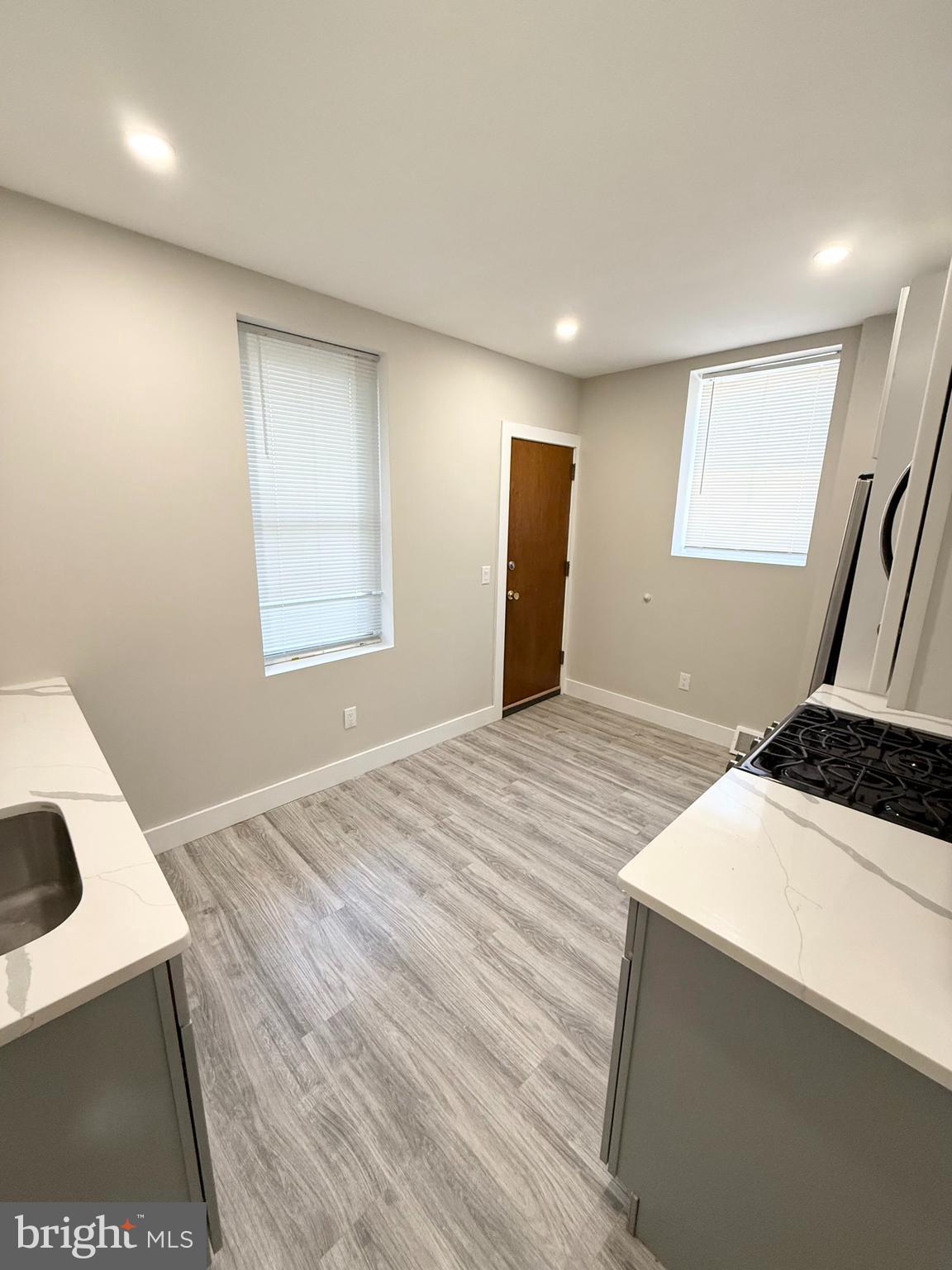 714 West Ritner Street, Unit 1 Philadelphia, PA 19148 - Photo 4 of 9 a room with a bed and a dresser