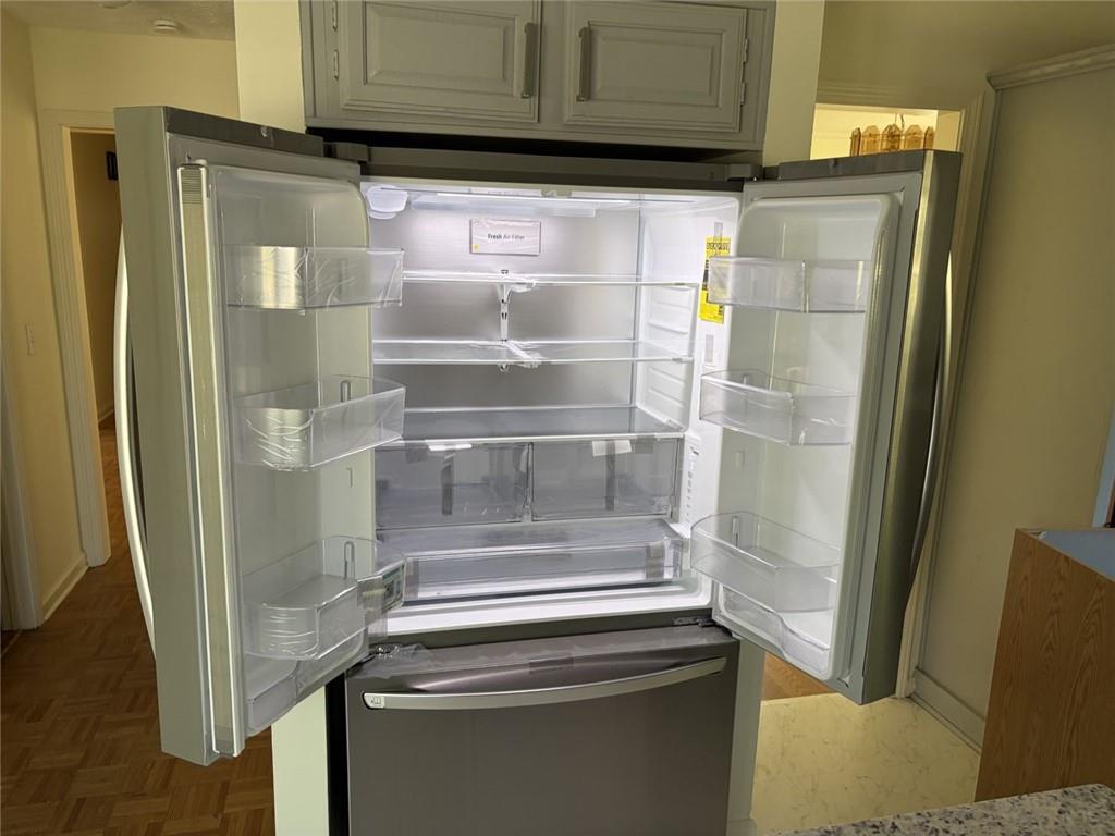 3089 Commons Crossing Snellville, GA 30078 - Photo 5 of 16 a refrigerator freezer sitting inside of a kitchen