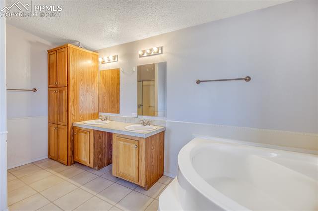 4765 South Johnson Road Rush, CO 80833 - Photo 28 of 36 Master bathroom