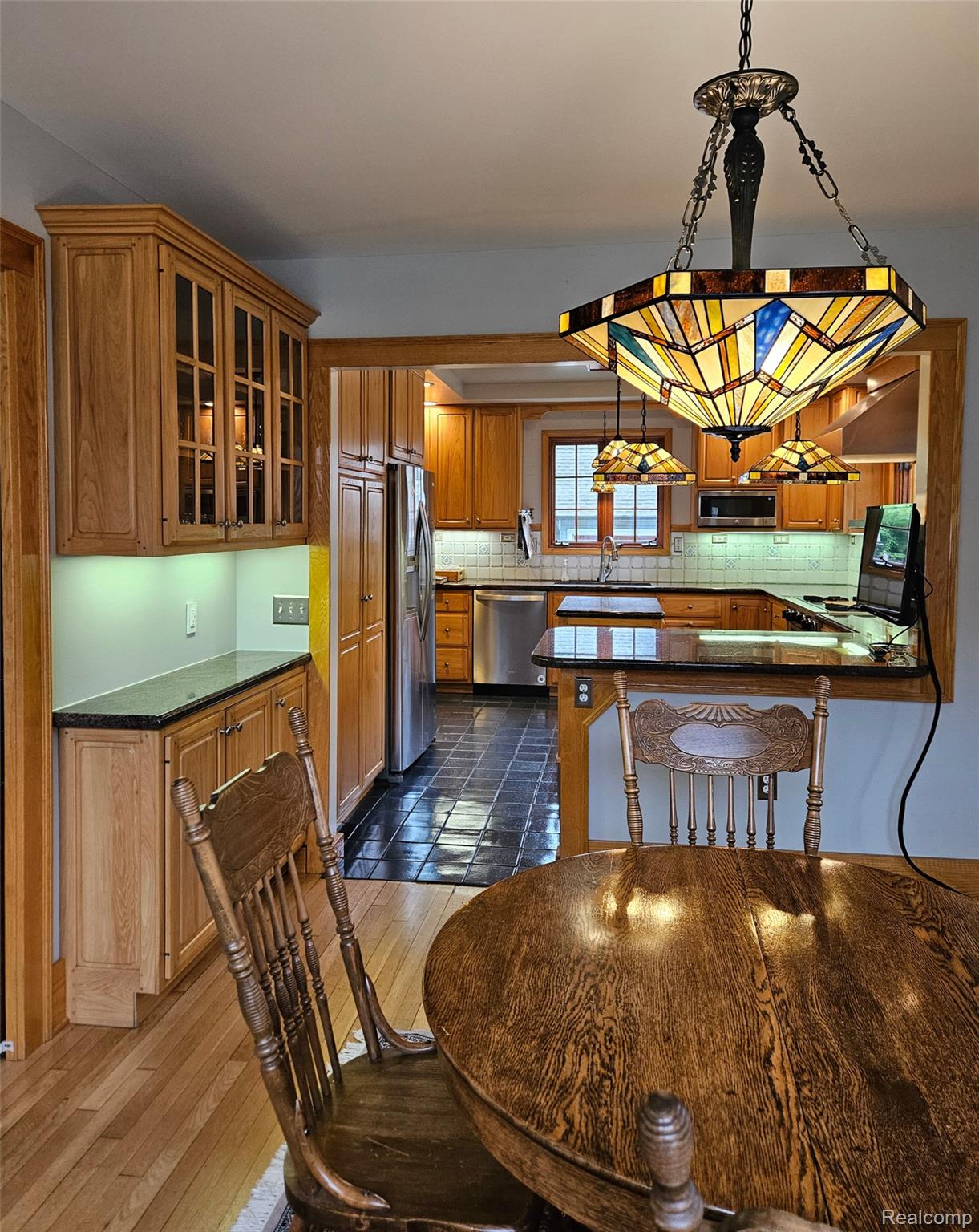 1235 Yorkshire Road Birmingham, MI 48009 - Photo 7 of 36 Dining space featuring dark wood-style floors