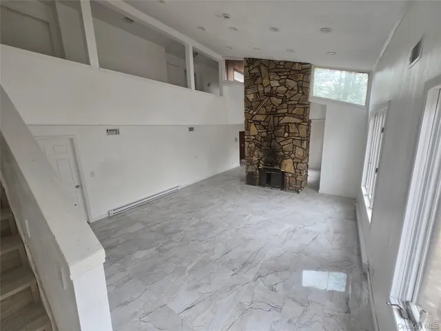 a view of entryway with stairs