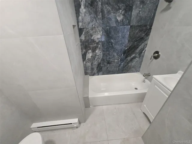 a view of staircase with white walls