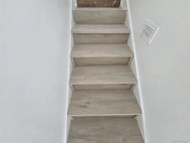 a view of livingroom with furniture and wooden floor