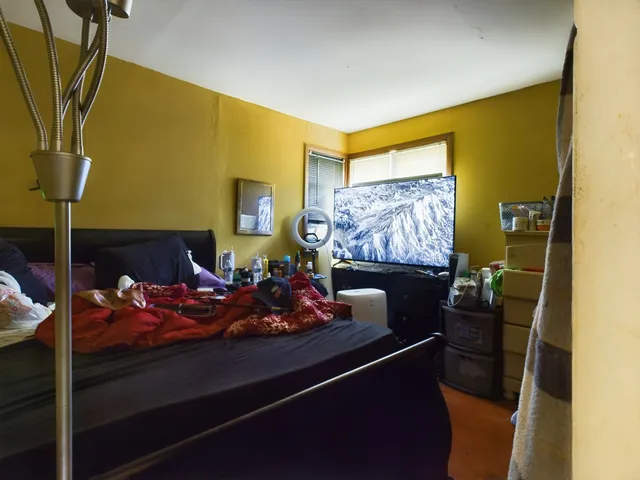 a room with furniture and screen