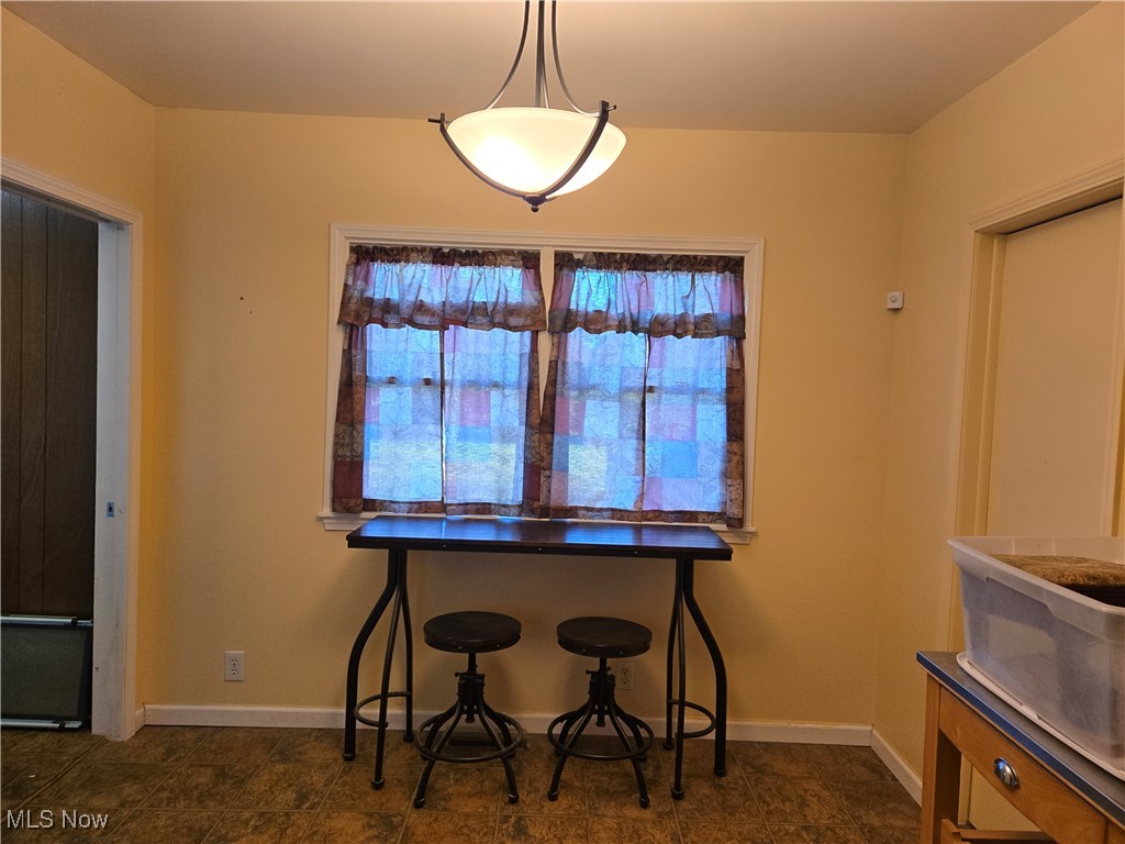 1962 Zenobia Road Norwalk, OH 44857 - Photo 6 of 30 Dining room with baseboards