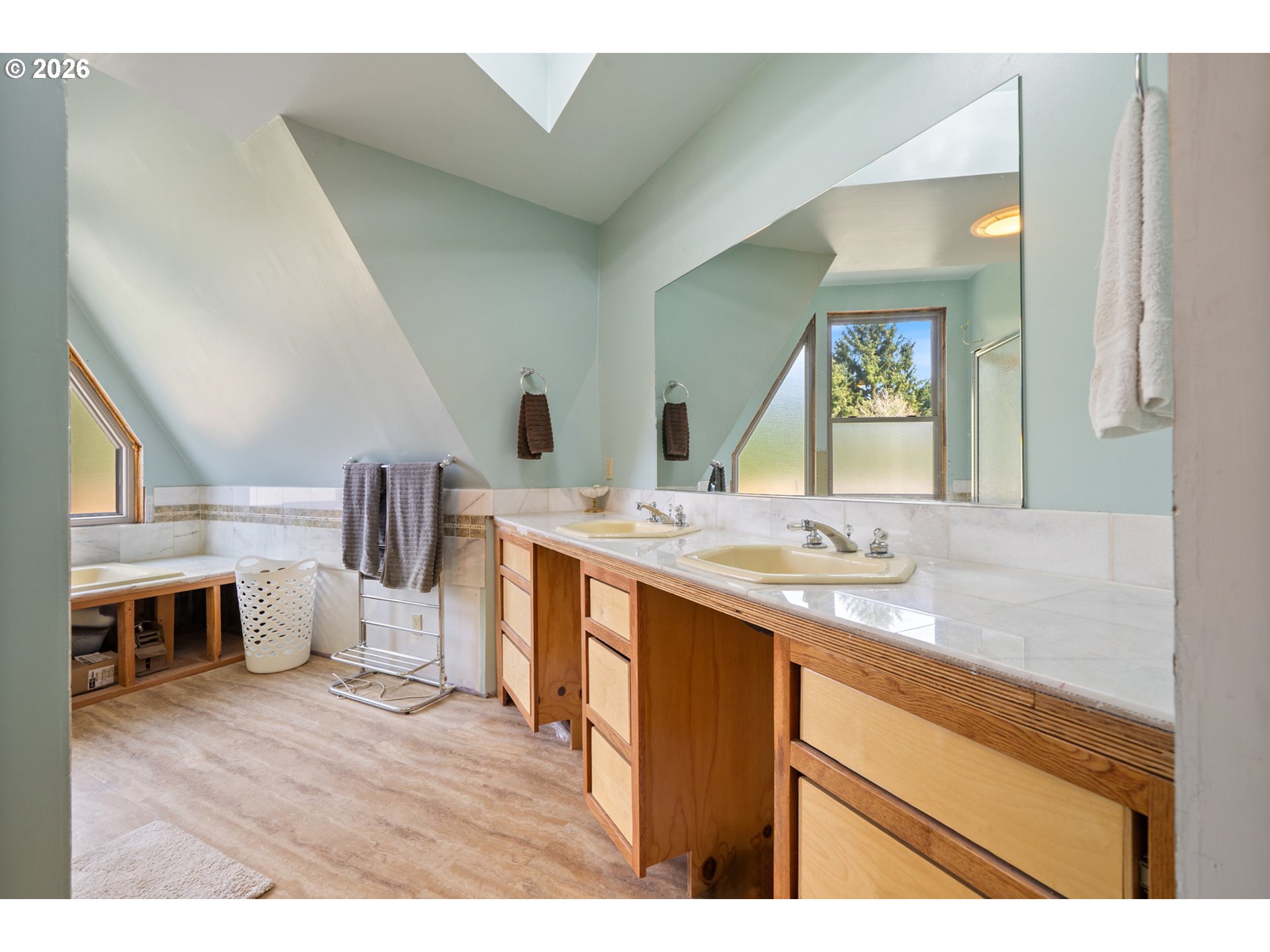2500 Whiskey Creek Road Tillamook, OR 97141 - Photo 25 of 46 a bathroom with a sink and a mirror