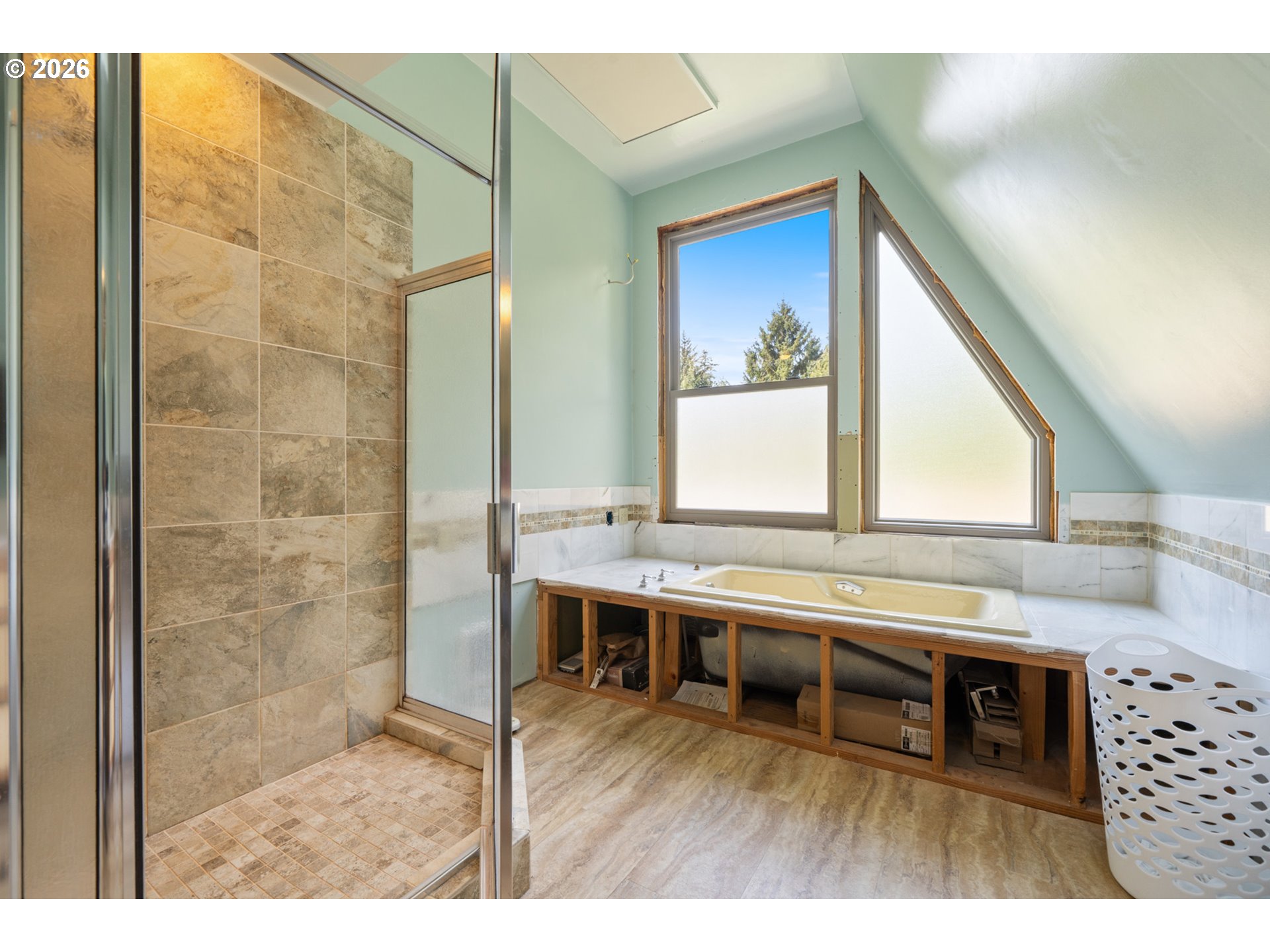 2500 Whiskey Creek Road Tillamook, OR 97141 - Photo 26 of 46 a room with stainless steel appliances kitchen island granite countertop a sink and wooden cabinets