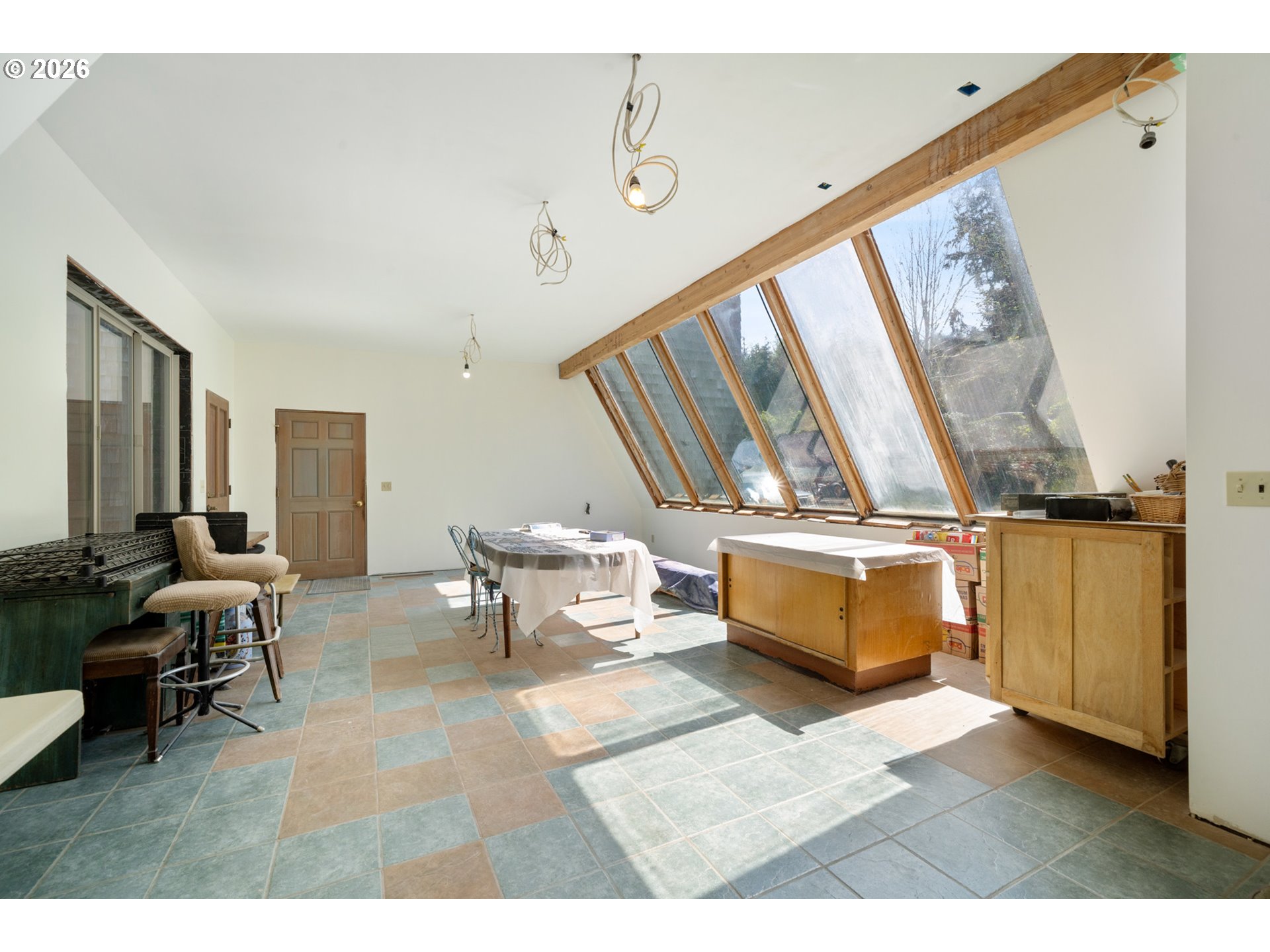 2500 Whiskey Creek Road Tillamook, OR 97141 - Photo 28 of 46 a living room with a couch and a table
